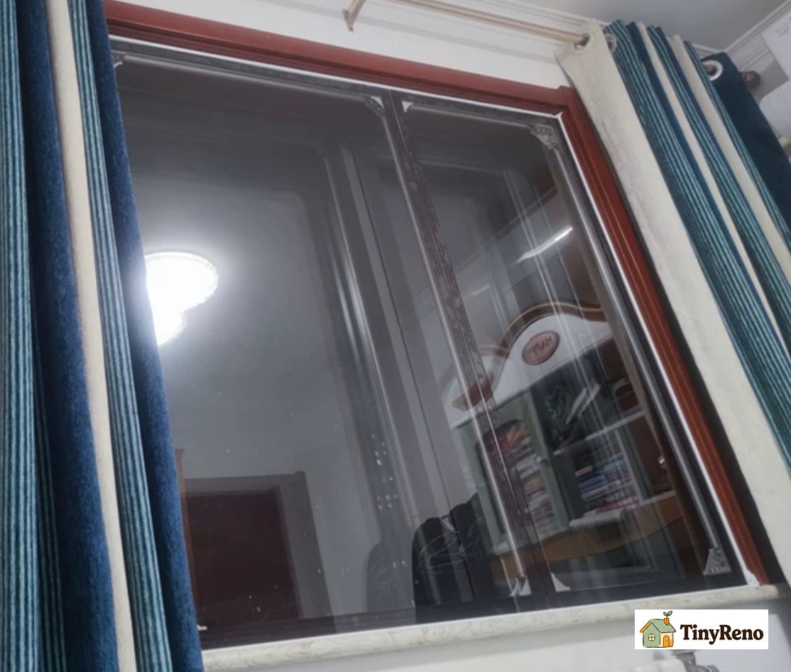 Clear acrylic or polycarbonate sheets mounted inside the frame with magnets or compression channels